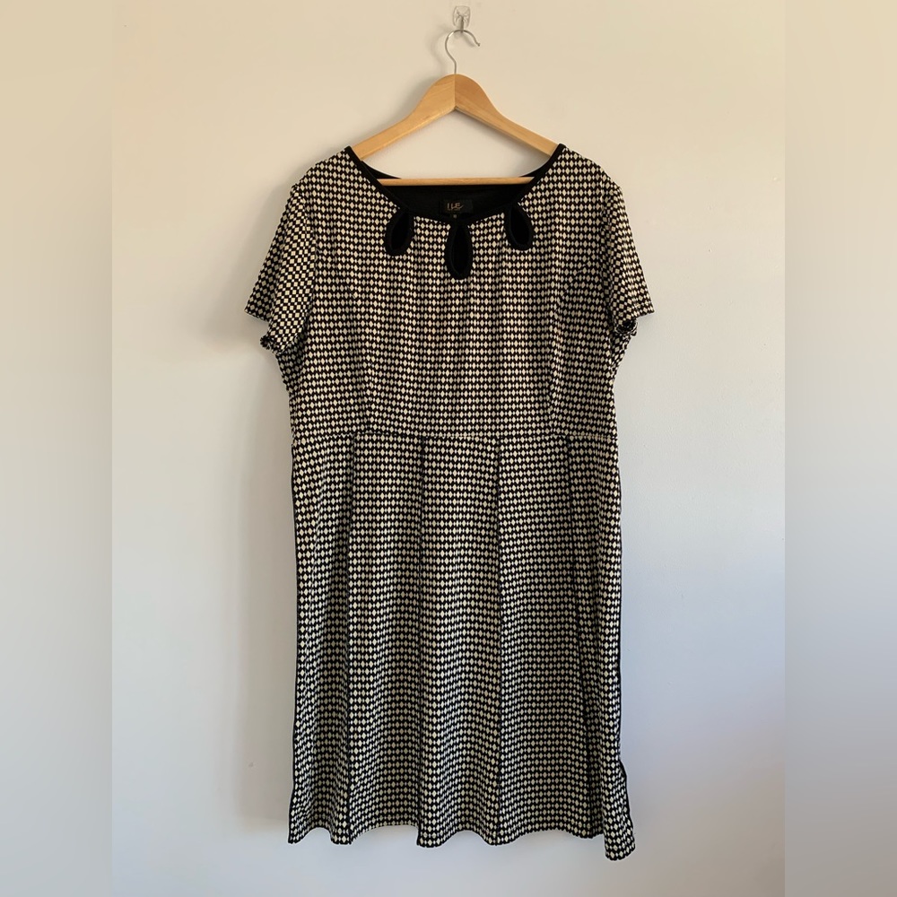 Off white diamond checker dress with keyholes and exposed hem. ILE New York